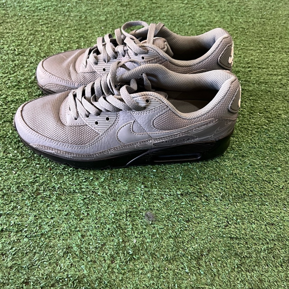Nike Gray Sneakers with Air Cushioning and Classic Design